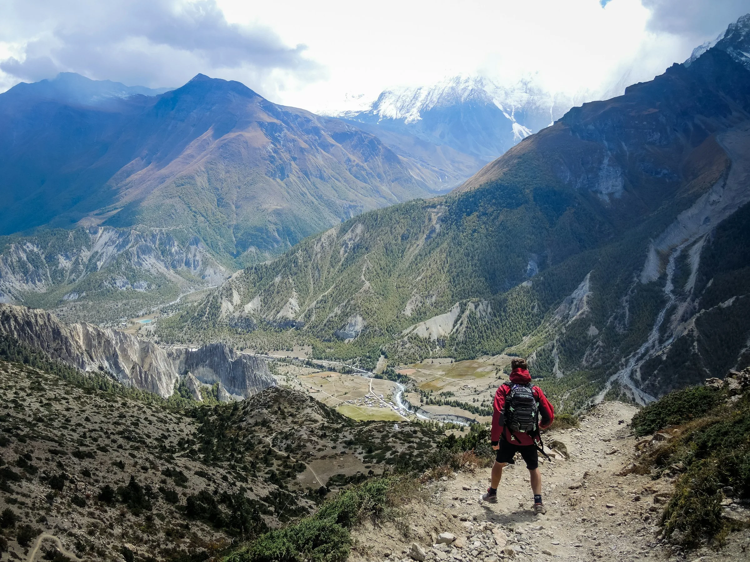 Solo trekker on a Nepal mountain trail
